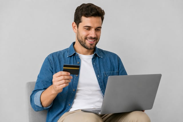 A Man Paying Online With His Credit Card